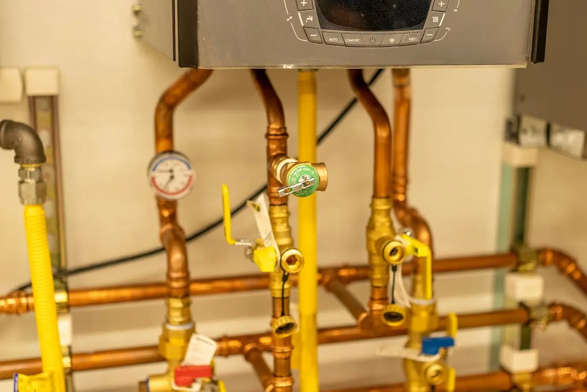 Licensed technician providing Slab Leak Repair for a homeowner in Sanbornton